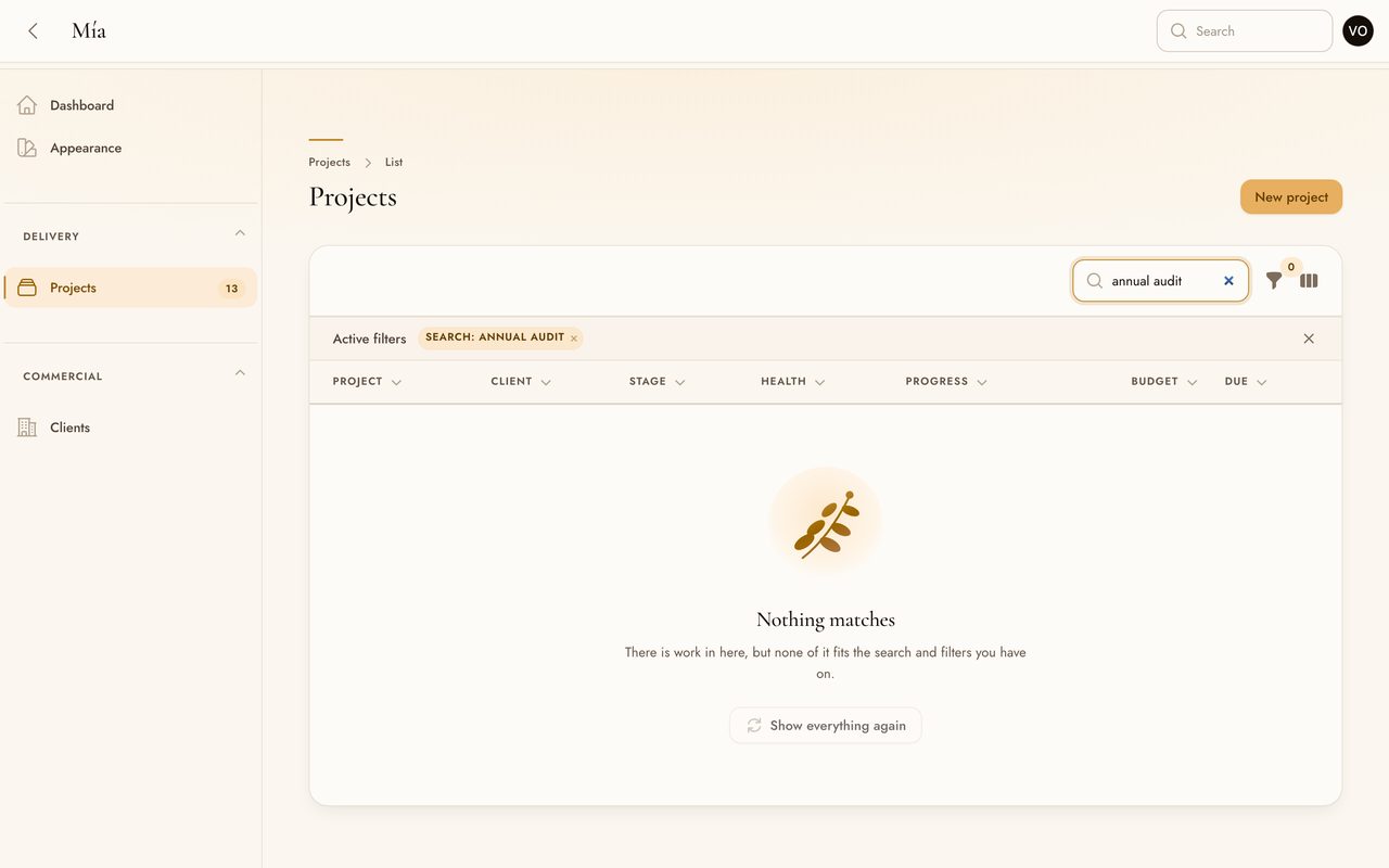 A projects table with a search that matches nothing: an illustrated mark in a warm halo, a heading reading Nothing matches, and an action to show everything again