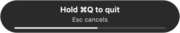 The hold-to-confirm prompt showing progress below the Command-Q quit shortcut hint